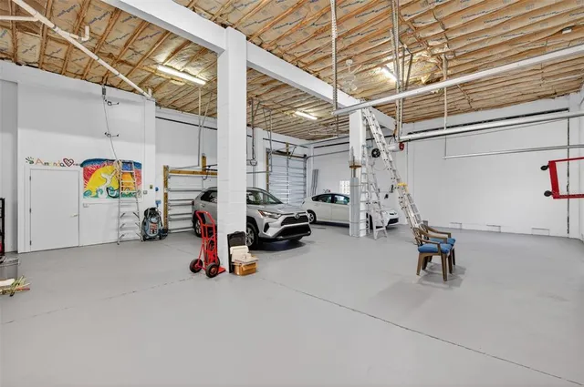 an aerial view of houses with outdoor space