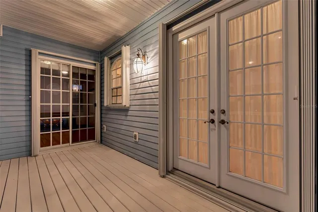 a view of a balcony with wooden floor