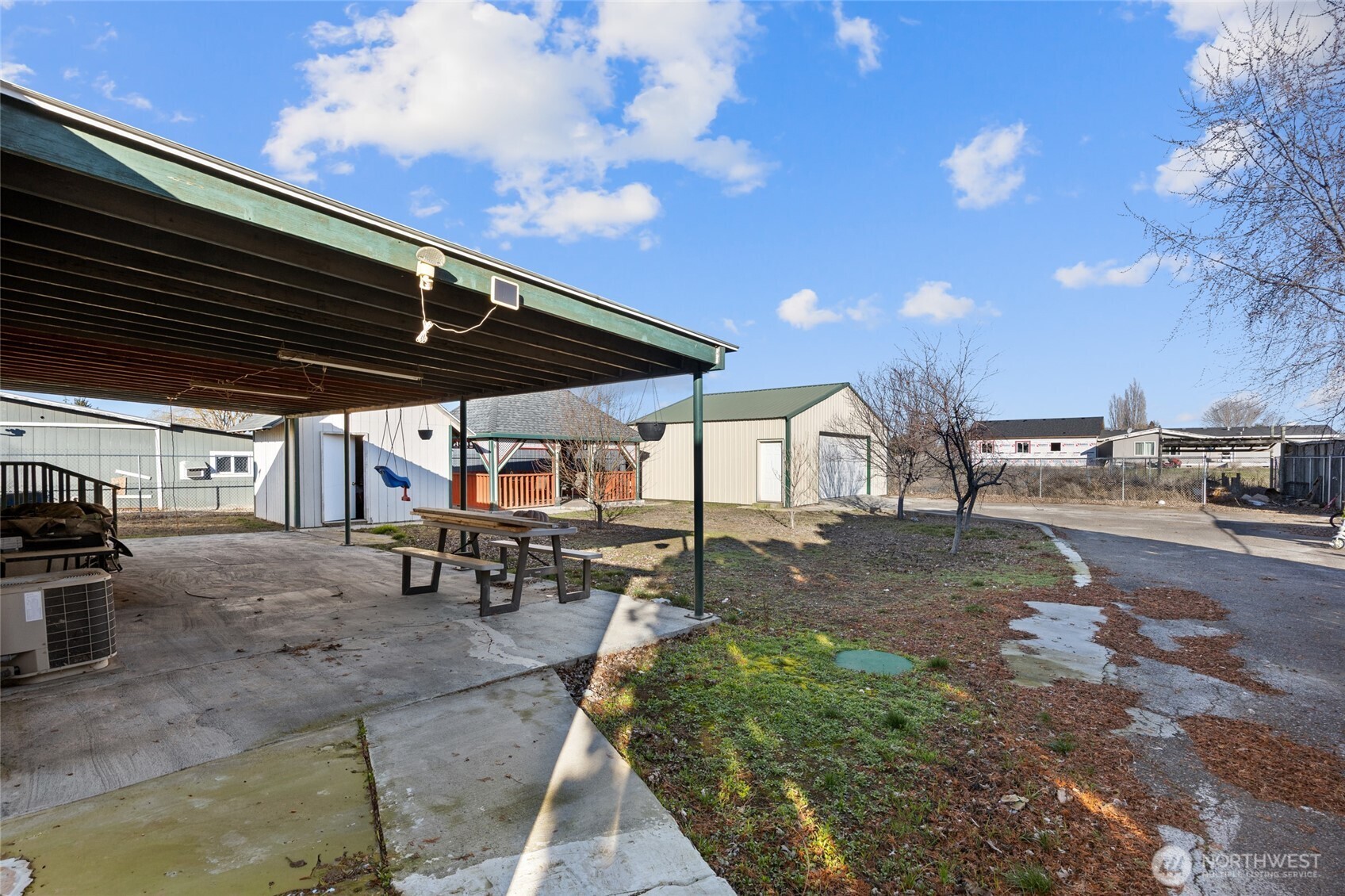 643 Kristina Road Othello, WA 99344 - Photo 22 of 33 a view of a backyard with sitting area