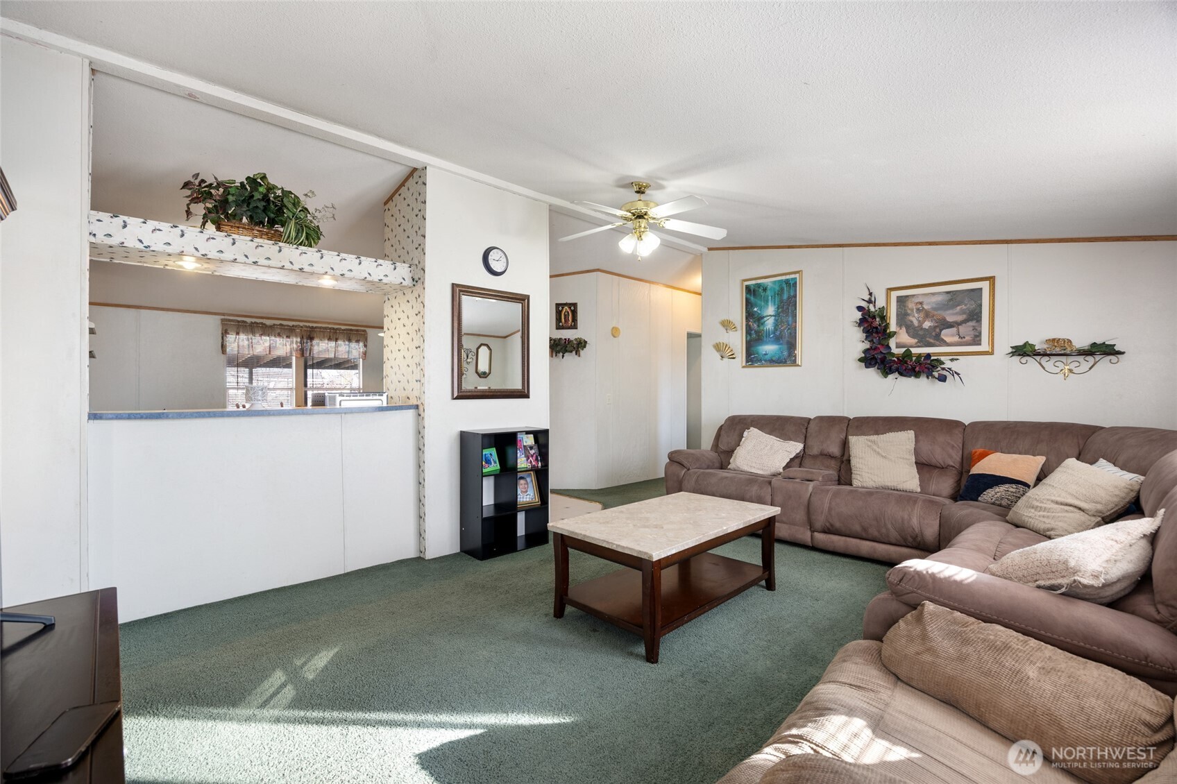 643 Kristina Road Othello, WA 99344 - Photo 5 of 33 a living room with furniture and a potted plant