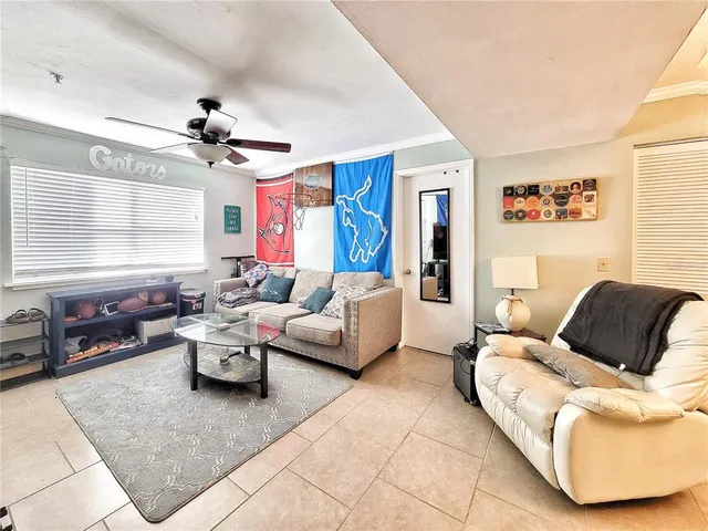 a living room with furniture or couch and a window