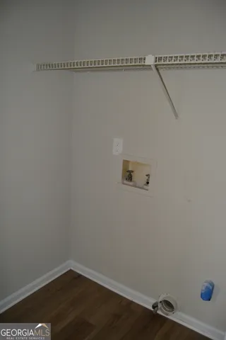 a view of entryway with wooden floor