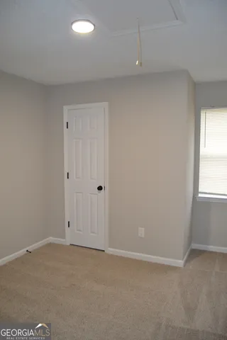 an empty room with a window