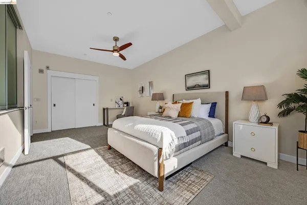 a bed room with a bed and a chandelier