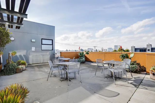 a view of a chairs and table on the terrace