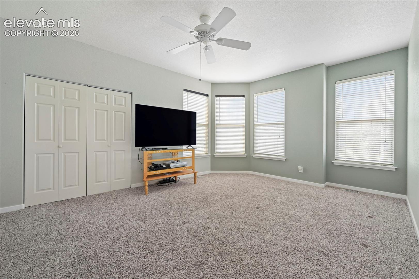 10096 Rolling Ridge Road Colorado Springs, CO 80925 - Photo 14 of 28 Guest Bedroom