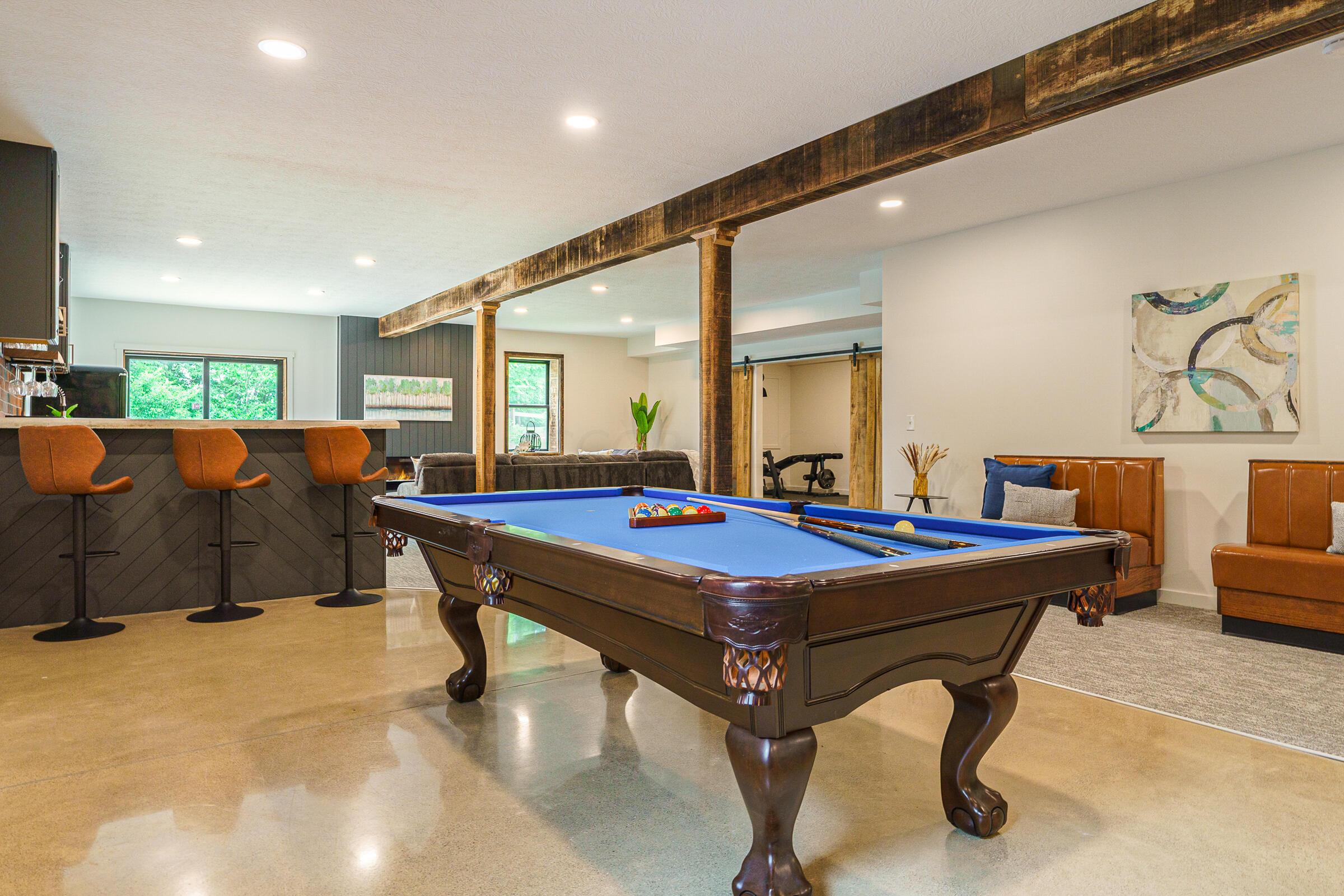 701 Ross Road Sunbury, OH 43074 - Photo 44 of 74 Open concept premium living space includes recreation, relaxation and well-planned function from the home gym to bonus bedrooms & a deluxe kitchenette