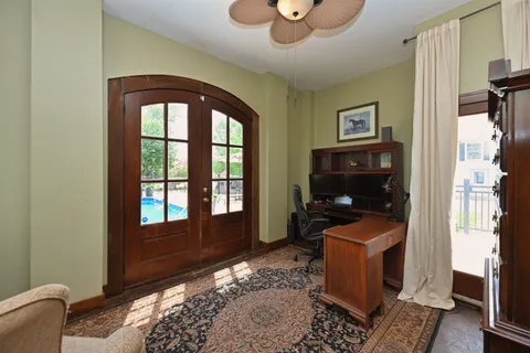 a front view of a house with a yard and porch