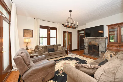 a view of a deck with a table and chairs