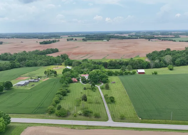 a view of livingroom with furniture wooden floor and windows