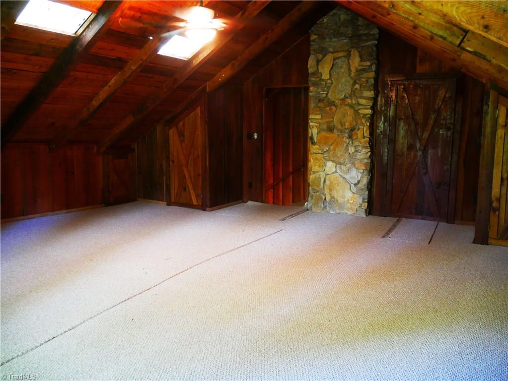 1676 Ray Loop Road Westfield, NC 27053 - Photo 17 of 25 Attic Room 2 entrance