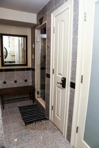 a view of a room with gym equipment