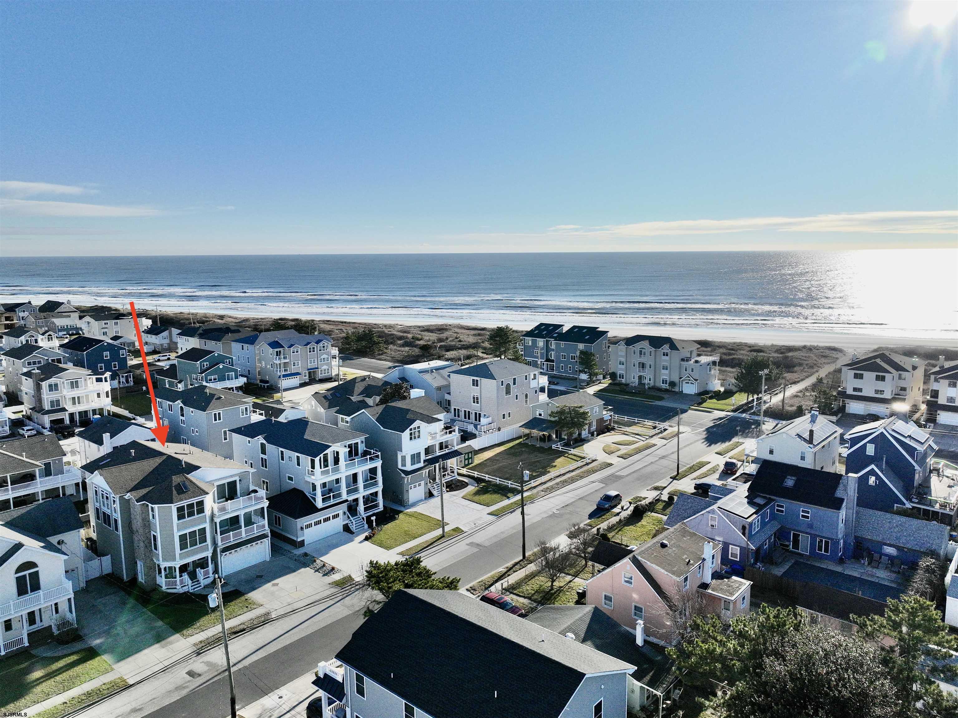 339 South 13th Street Brigantine, NJ 08203 - Photo 2 of 57 an aerial view of residential houses with outdoor space