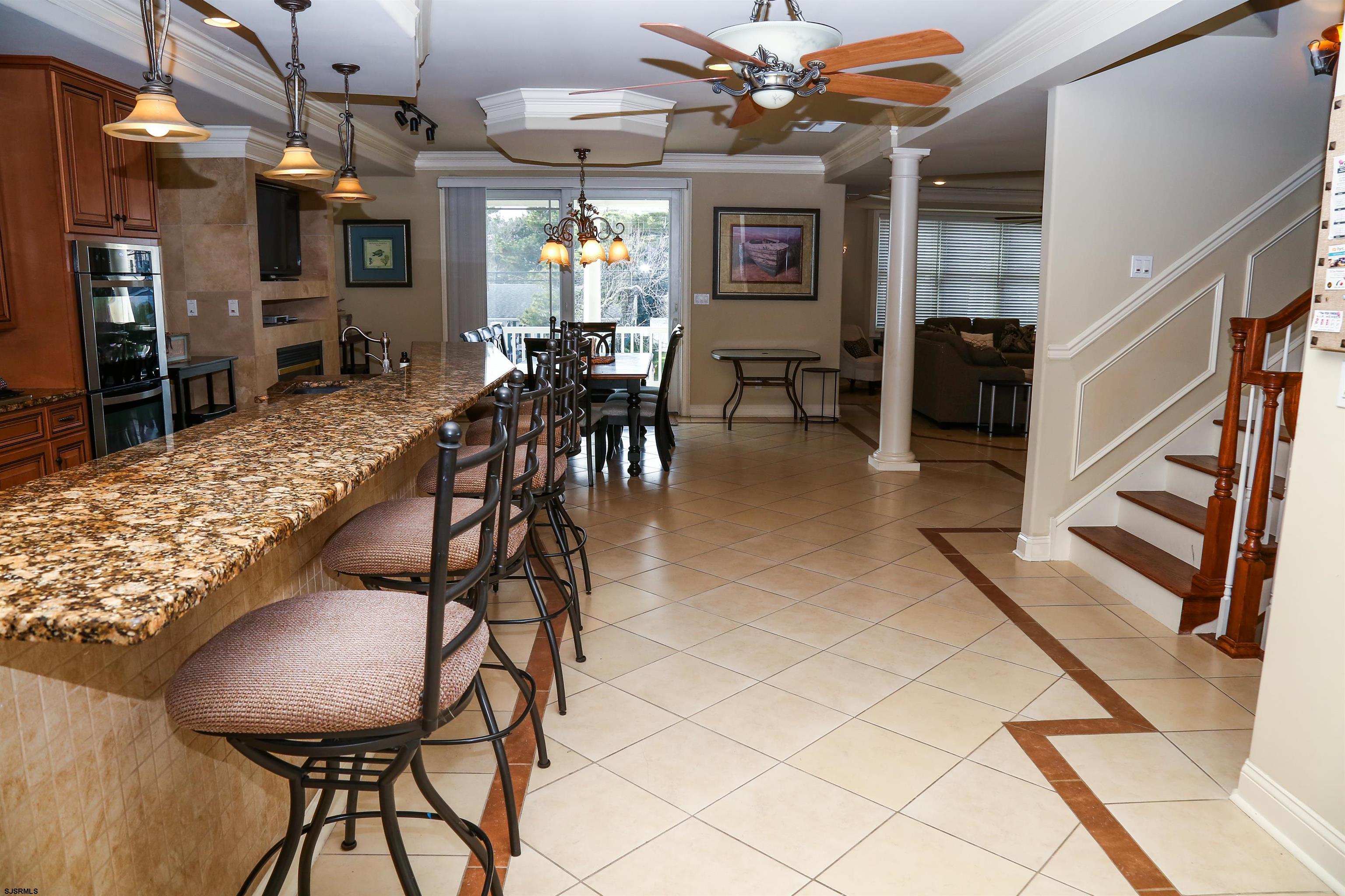 339 South 13th Street Brigantine, NJ 08203 - Photo 23 of 57 a view of a livingroom with furniture and a chandelier