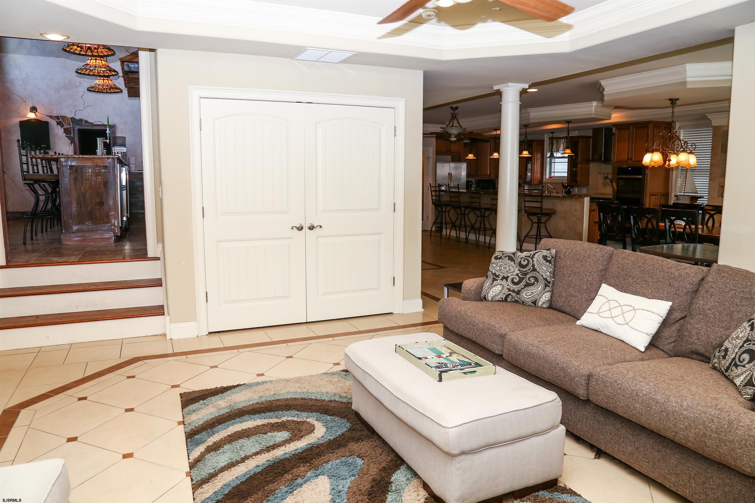 339 South 13th Street Brigantine, NJ 08203 - Photo 28 of 57 a living room with furniture and a window