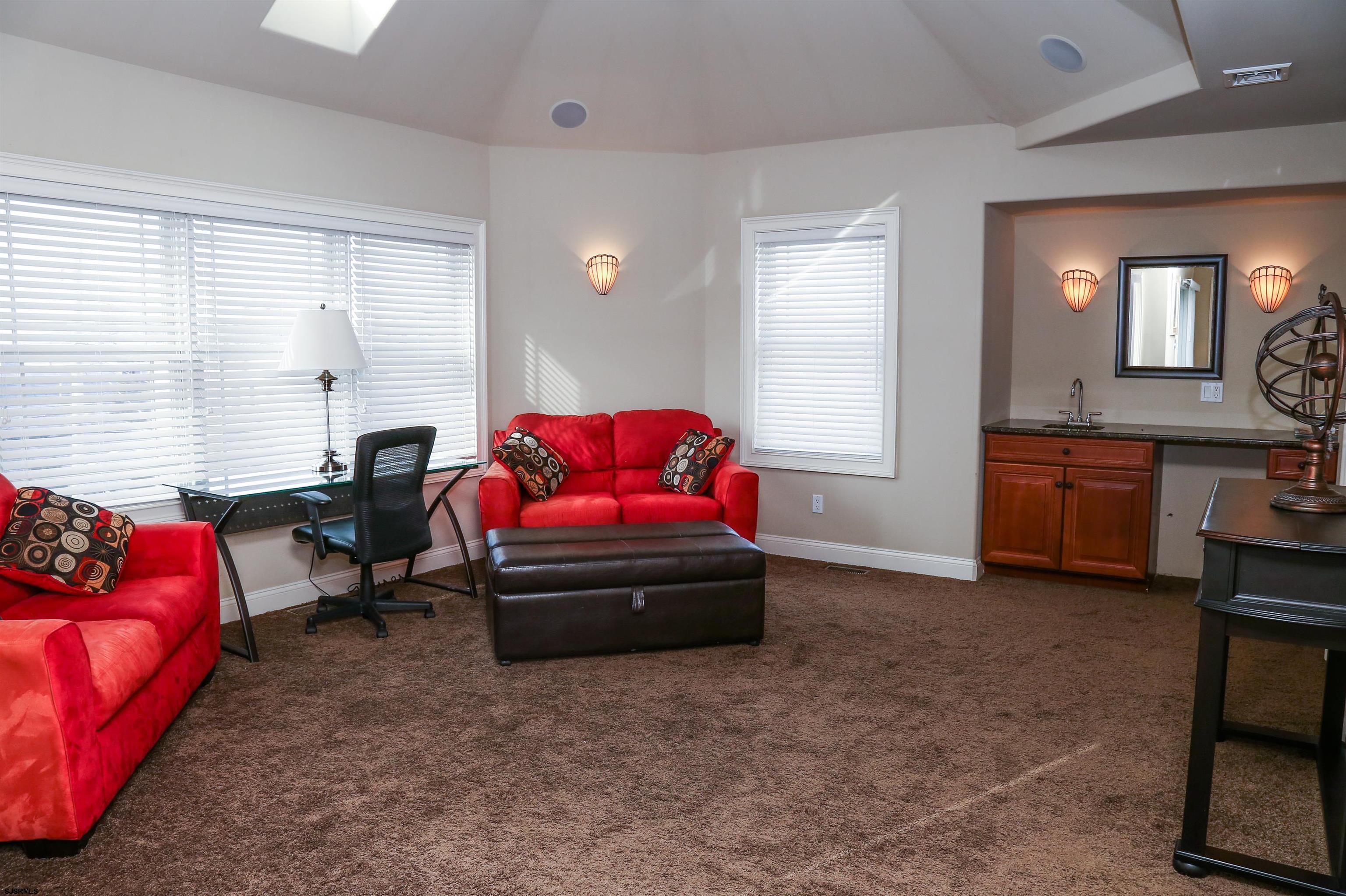 339 South 13th Street Brigantine, NJ 08203 - Photo 46 of 57 a living room with furniture and a window