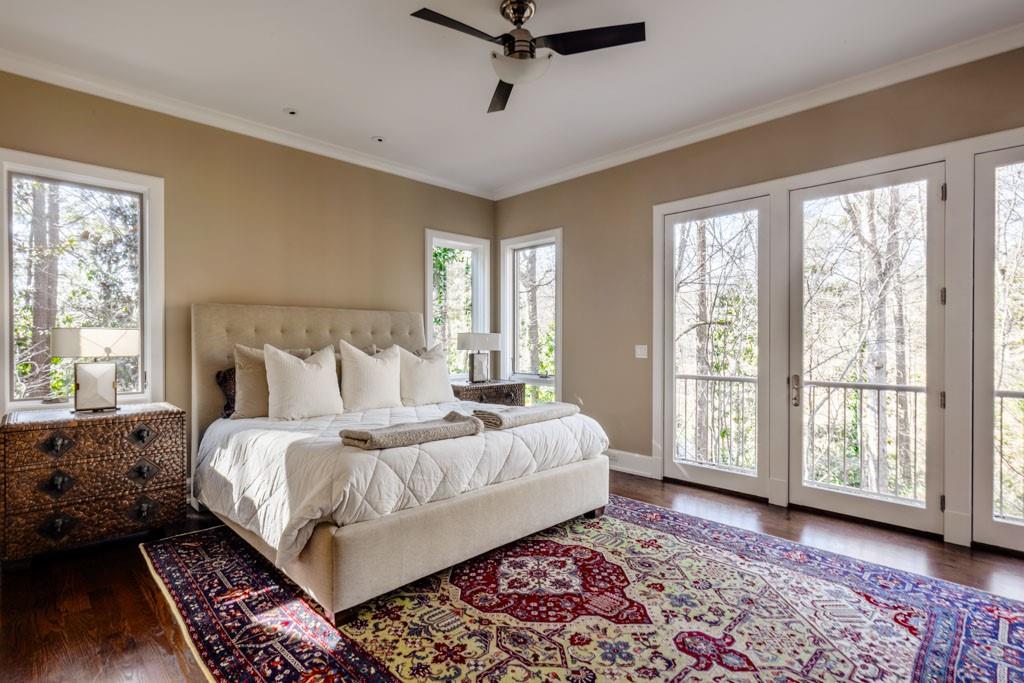 4036 Conway Valley Road Northwest Atlanta, GA 30327 - Photo 13 of 26 a bedroom with bed and a window