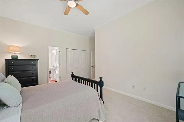 a bathroom with a granite countertop sink and a bathtub