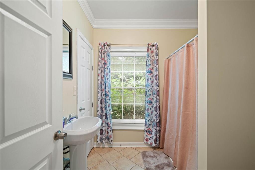 106 Shalea Lane Ball Ground, GA 30107 - Photo 40 of 52 a bathroom with a sink toilet and shower