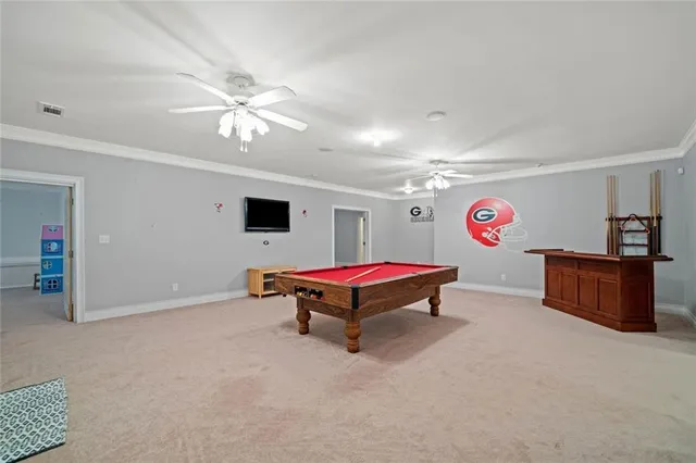 a view of a house with a yard and sitting area