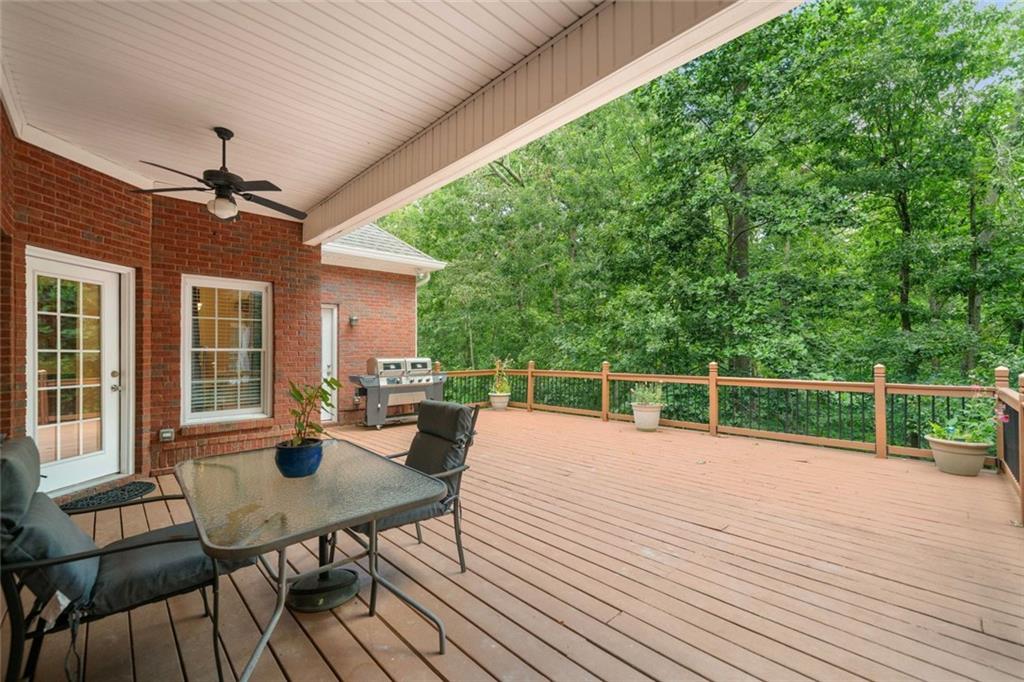 106 Shalea Lane Ball Ground, GA 30107 - Photo 52 of 52 a view of a house with backyard and sitting area