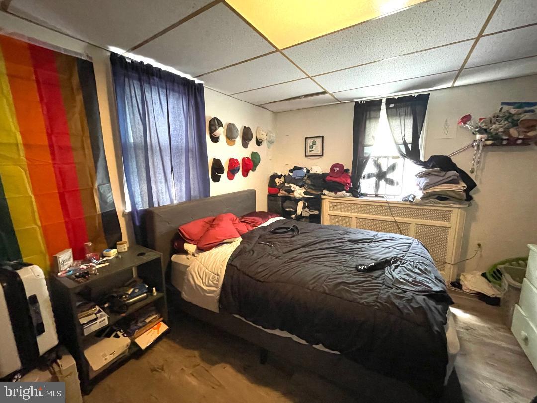 904-906 Main Avenue Croydon, PA 19021 - Photo 40 of 51 a bedroom with a bed and wooden floor