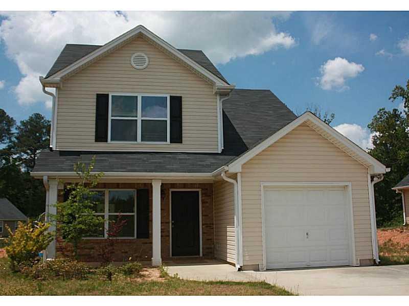 117 Rockefeller Lane Dallas, GA 30157 - Photo 1 of 1 Exterior Front. Attractive front elevation with stacked stone and covered porch