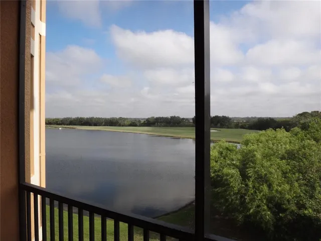 a view of a lake from a window