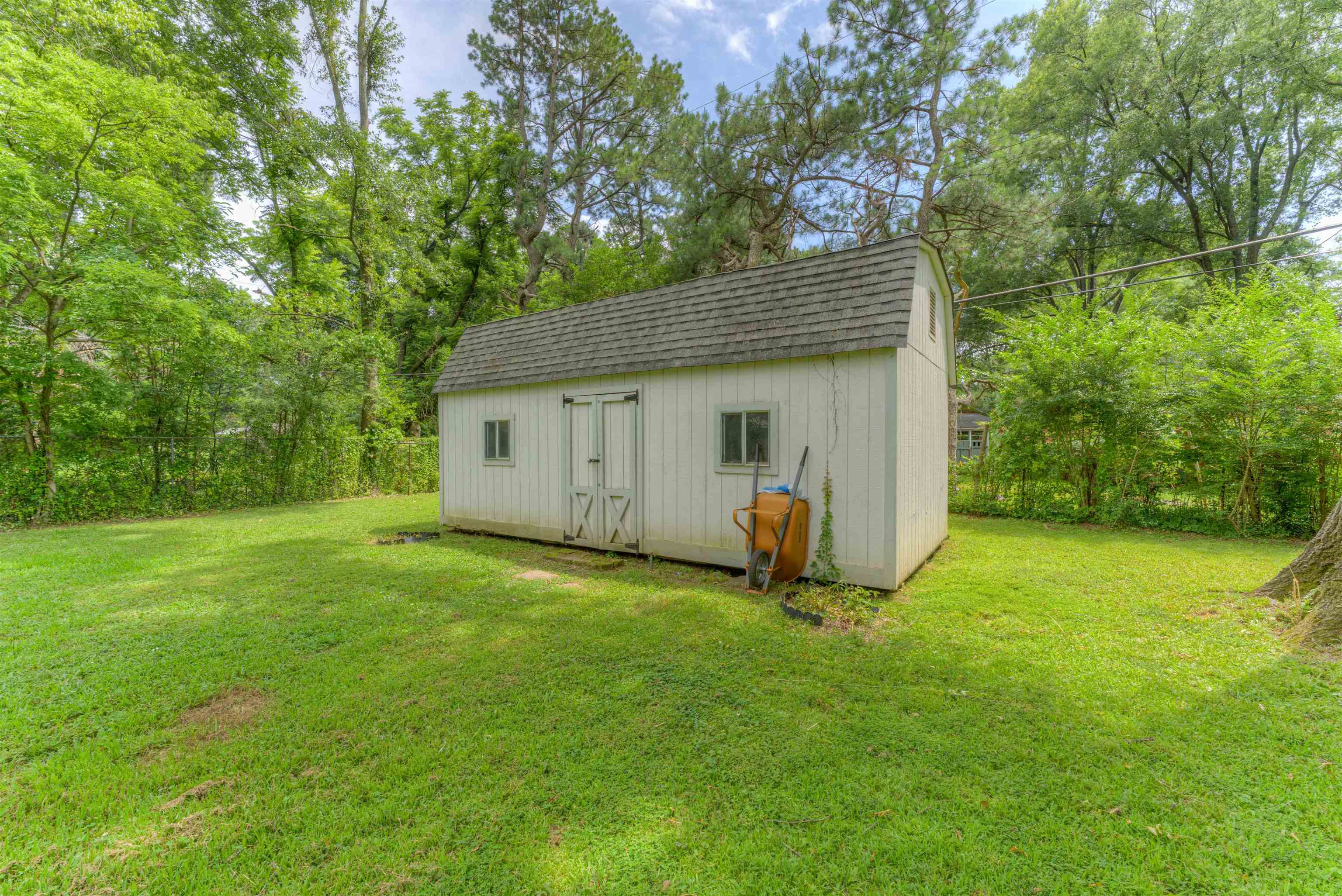 4427 Quince Road Memphis, TN 38117 - Photo 4 of 26 a view of a house with backyard