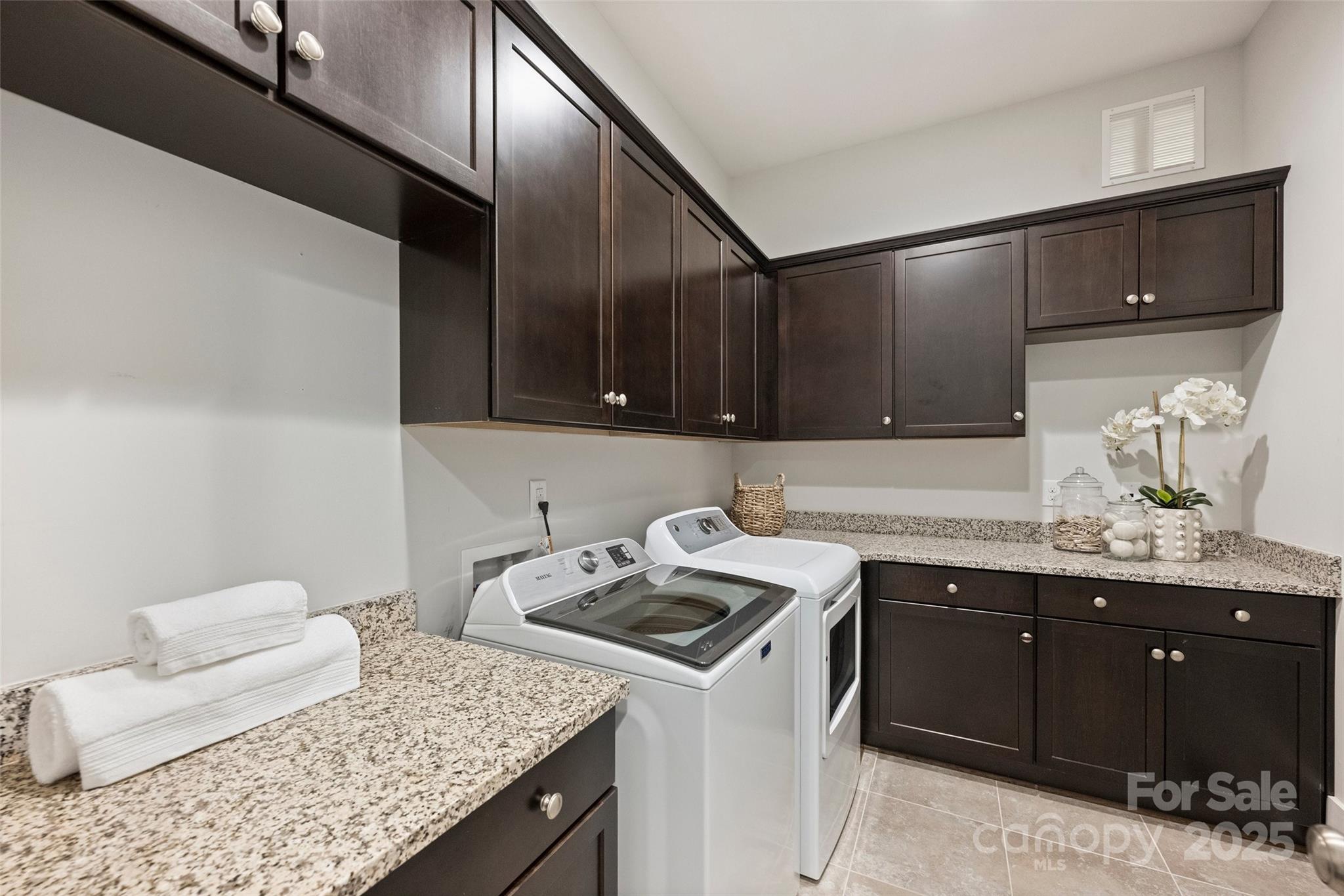 1550 Matthew McClure Circle Davidson, NC 28036 - Photo 18 of 38 a kitchen with a sink dishwasher and cabinets