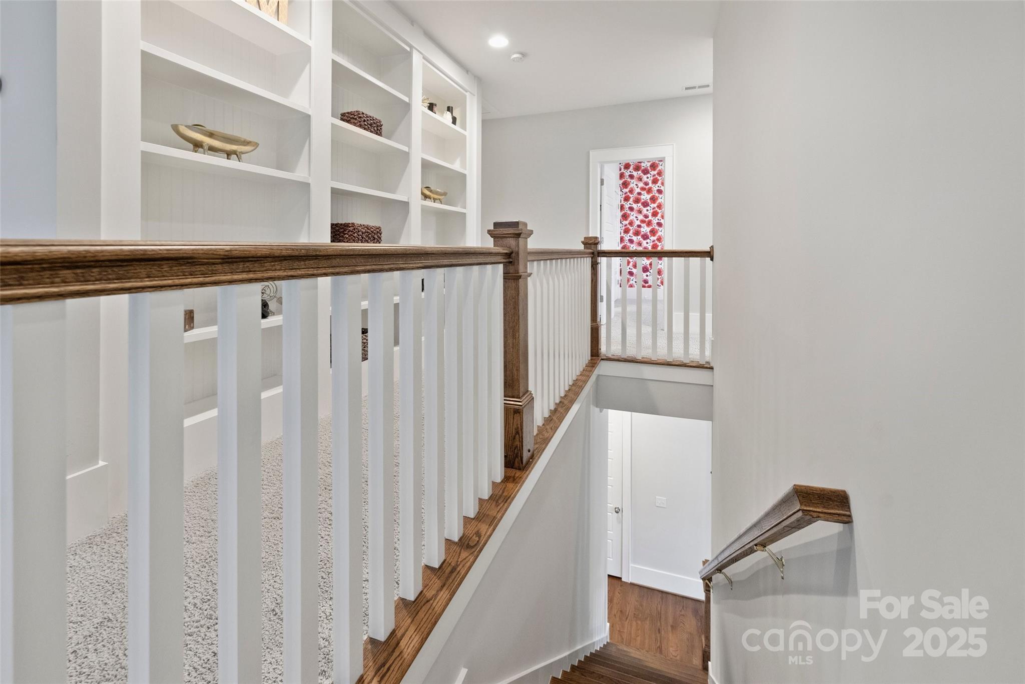 1550 Matthew McClure Circle Davidson, NC 28036 - Photo 19 of 38 a view of a hallway with windows