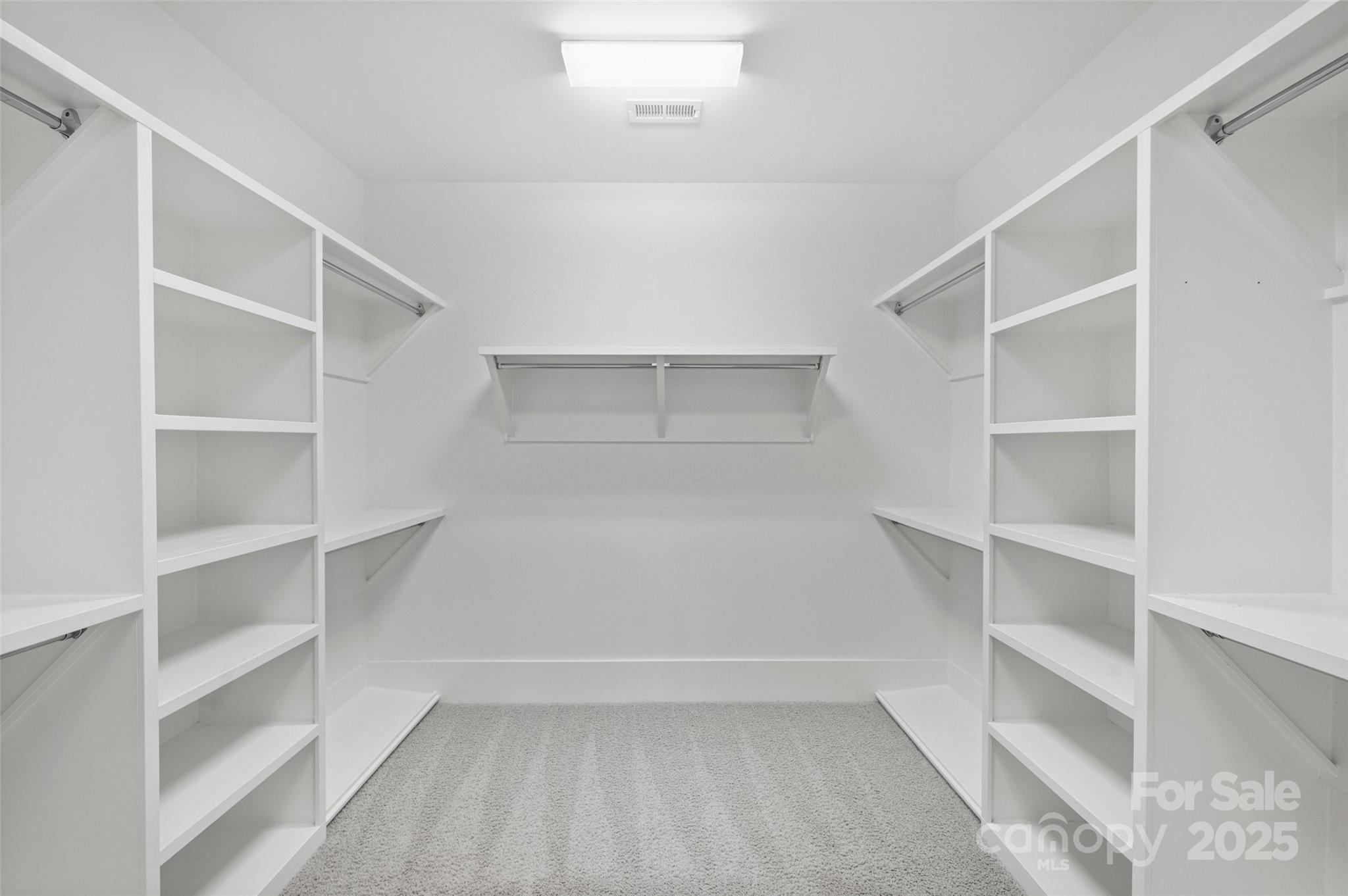 1550 Matthew McClure Circle Davidson, NC 28036 - Photo 26 of 38 a view of an empty walk in closet