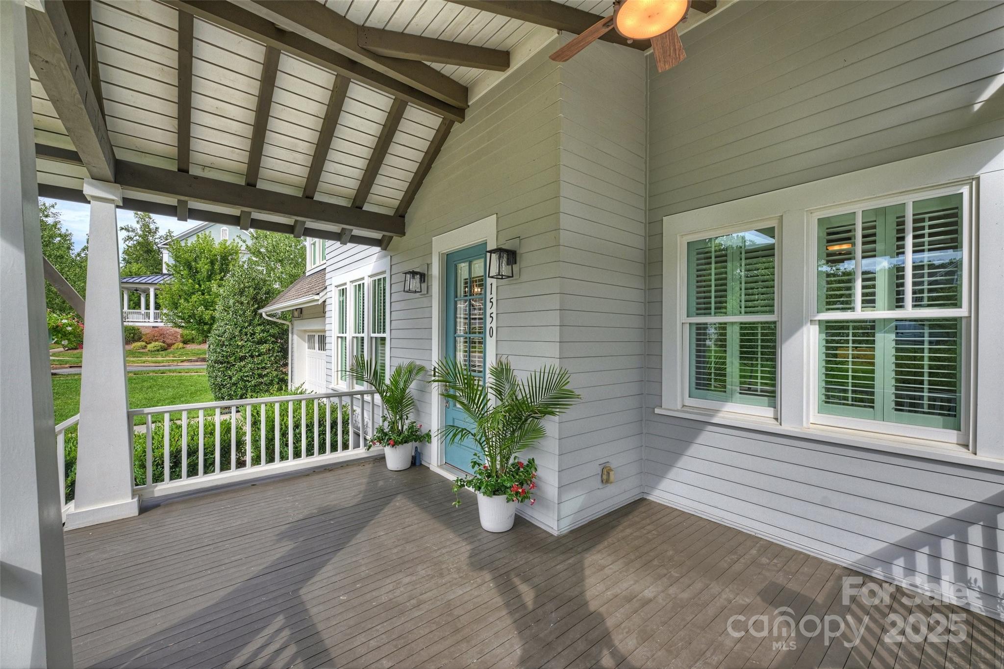 1550 Matthew McClure Circle Davidson, NC 28036 - Photo 3 of 38 a view of a porch with wooden floor