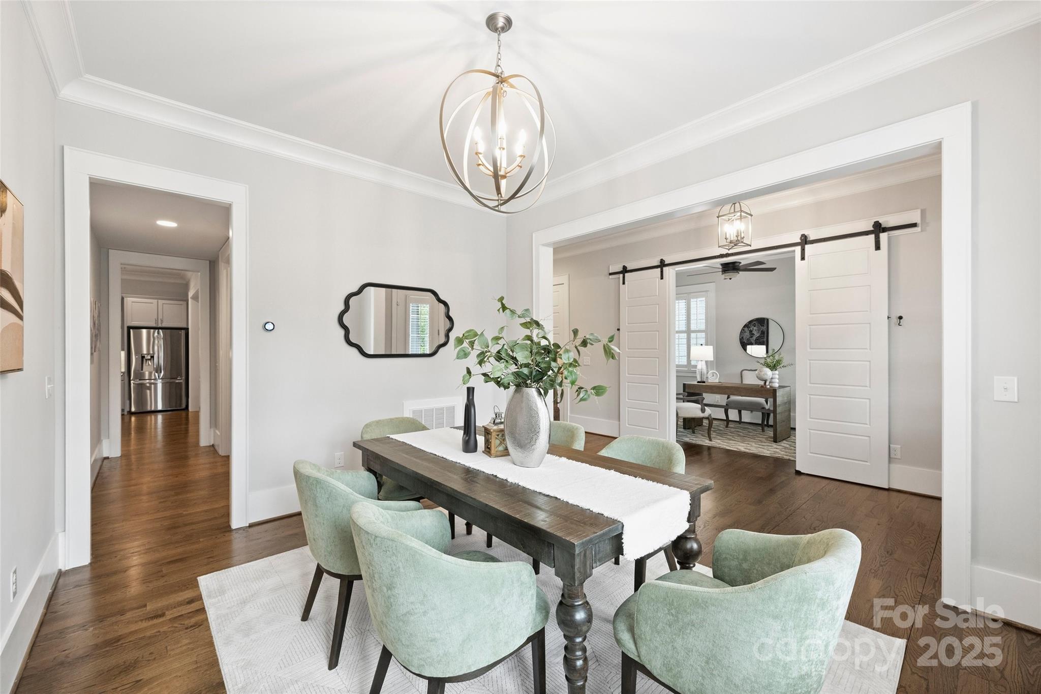 1550 Matthew McClure Circle Davidson, NC 28036 - Photo 6 of 38 a dining room with furniture and wooden floor