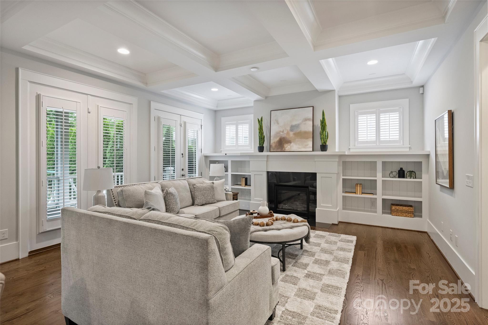1550 Matthew McClure Circle Davidson, NC 28036 - Photo 9 of 38 a living room with furniture and a fireplace