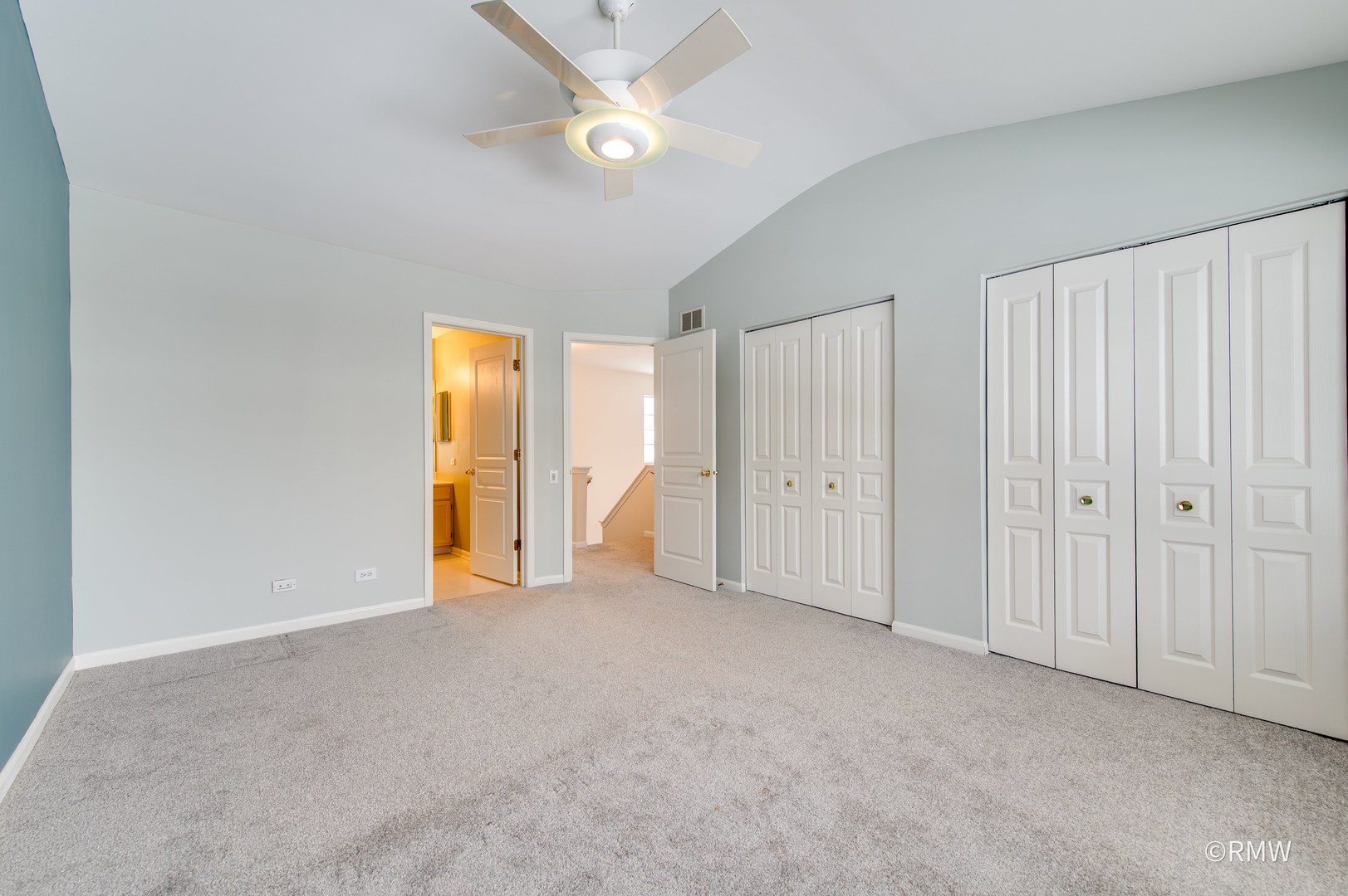 1223 Summersweet Lane Bartlett, IL 60103 - Photo 13 of 22 an empty room with closet and a ceiling fan