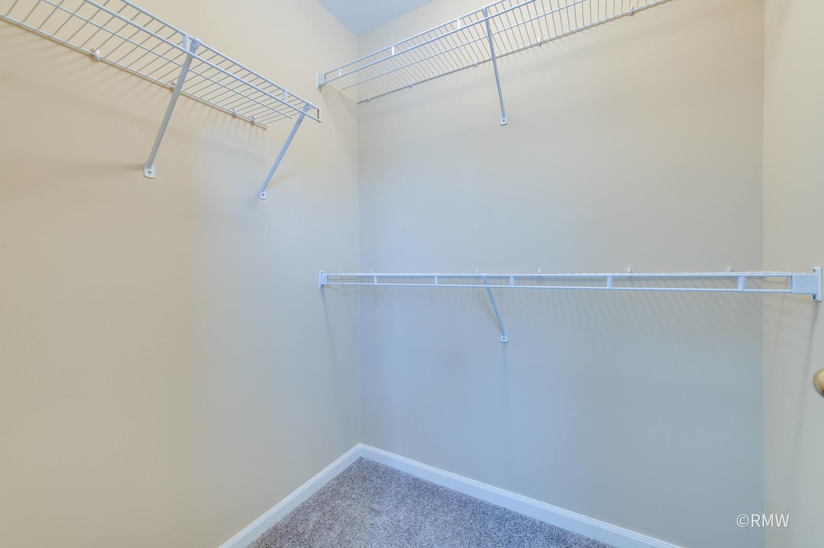1223 Summersweet Lane Bartlett, IL 60103 - Photo 16 of 22 a view of a room with racks on the wall