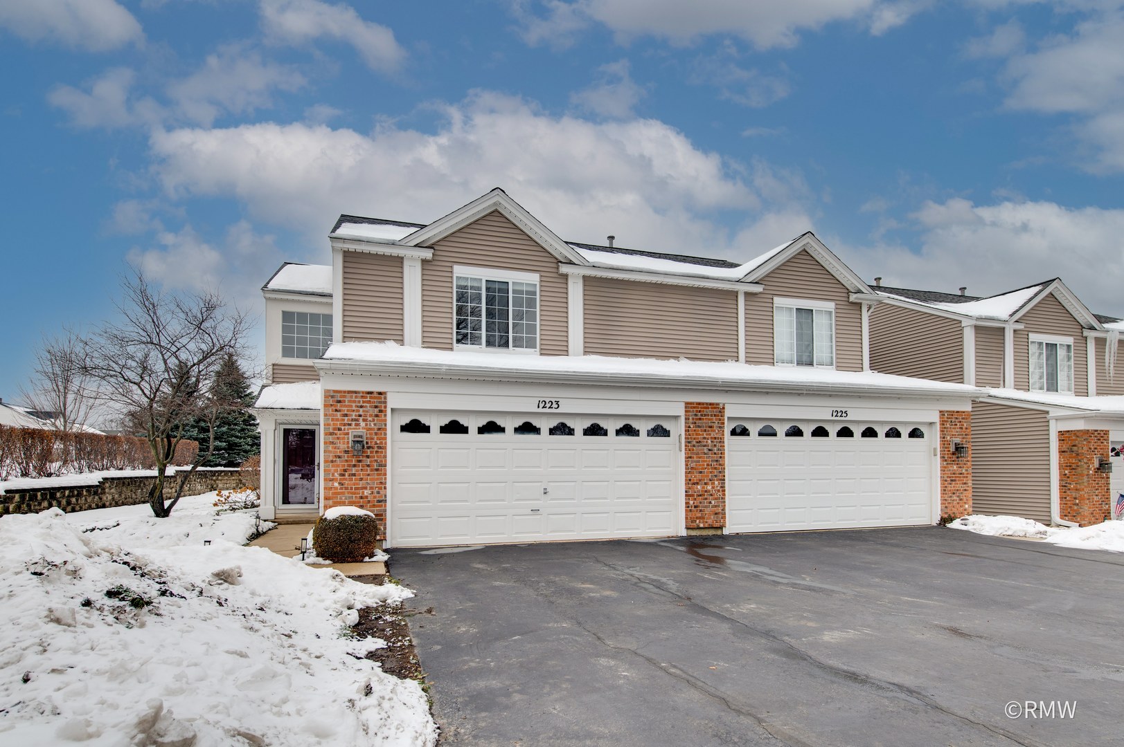 1223 Summersweet Lane Bartlett, IL 60103 - Photo 2 of 22 a front view of a house with a yard