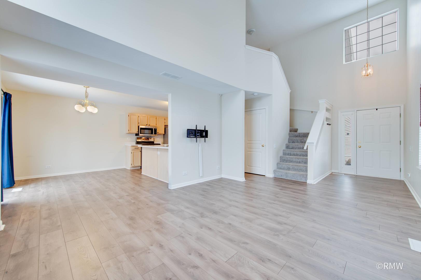 1223 Summersweet Lane Bartlett, IL 60103 - Photo 5 of 22 a view of a kitchen with a sink cabinets and a window