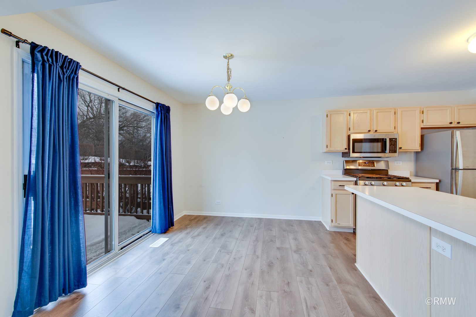 1223 Summersweet Lane Bartlett, IL 60103 - Photo 6 of 22 a kitchen with stainless steel appliances a refrigerator and a stove top oven