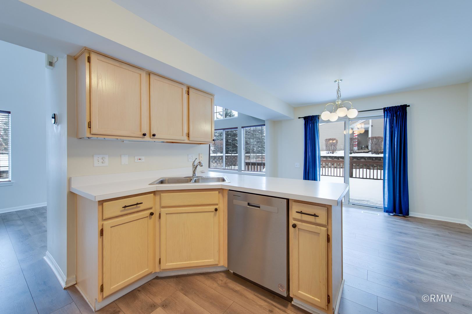 1223 Summersweet Lane Bartlett, IL 60103 - Photo 9 of 22 a kitchen with a sink cabinets and wooden floor
