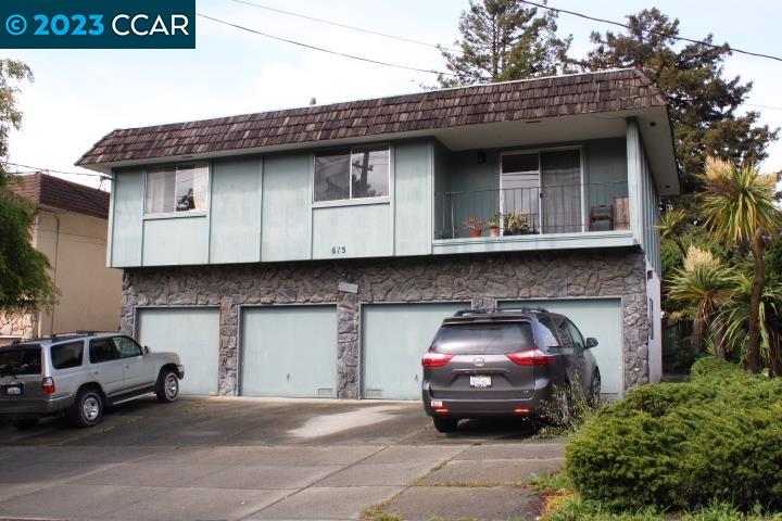 615 Lexington Avenue, Unit B El Cerrito, CA 94530 - Photo 1 of 18 a view of a car parked in front of a house