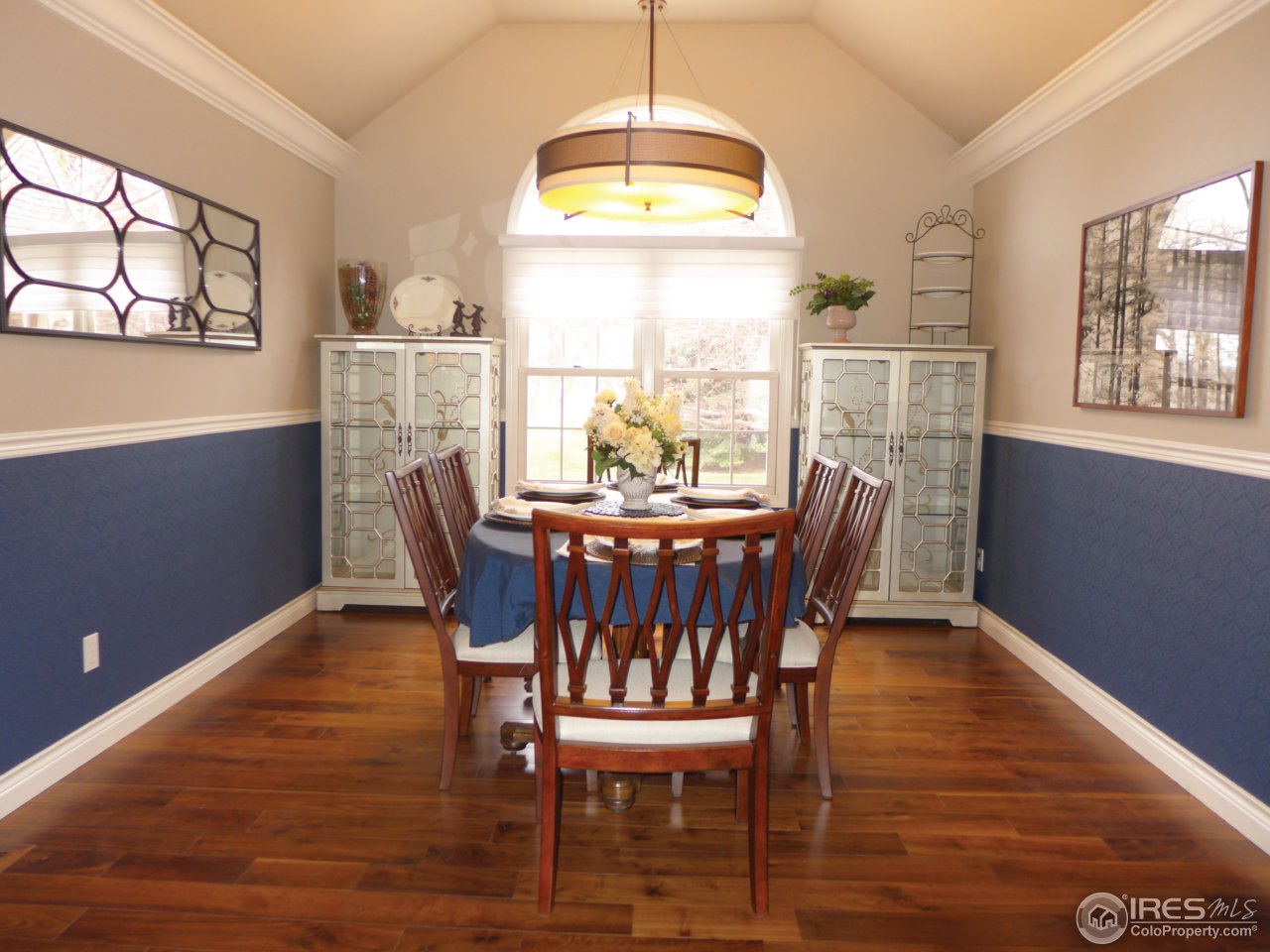 1915 Country Club Road Fort Collins, CO 80524 - Photo 15 of 25 Formal dining with stunning walnut floors