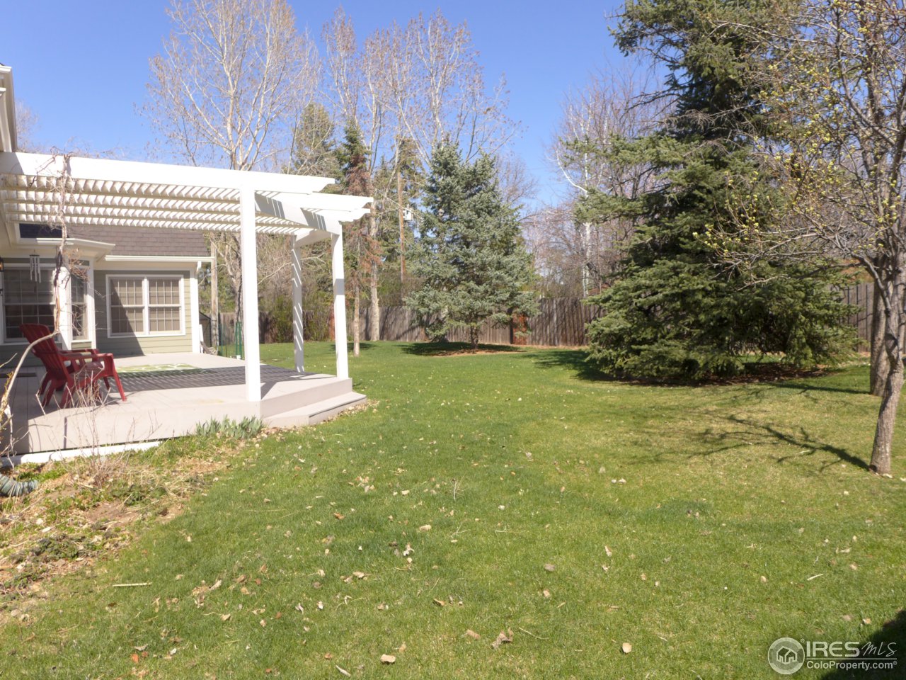1915 Country Club Road Fort Collins, CO 80524 - Photo 7 of 25 Large deck in the backyard