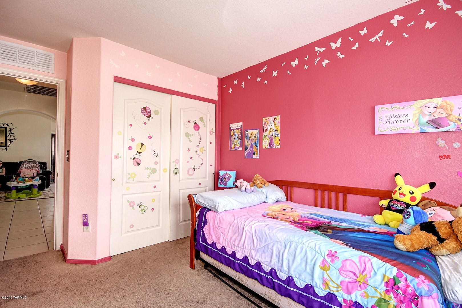 6016 South Avenida Ribero Tucson, AZ 85706 - Photo 12 of 15 a bedroom with a bed and a dresser