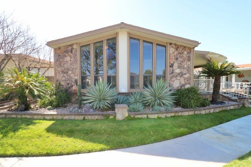 641 Crest Lake Circle, Unit 223 Brea, CA 92821 - Photo 1 of 1 a front view of a house with a yard