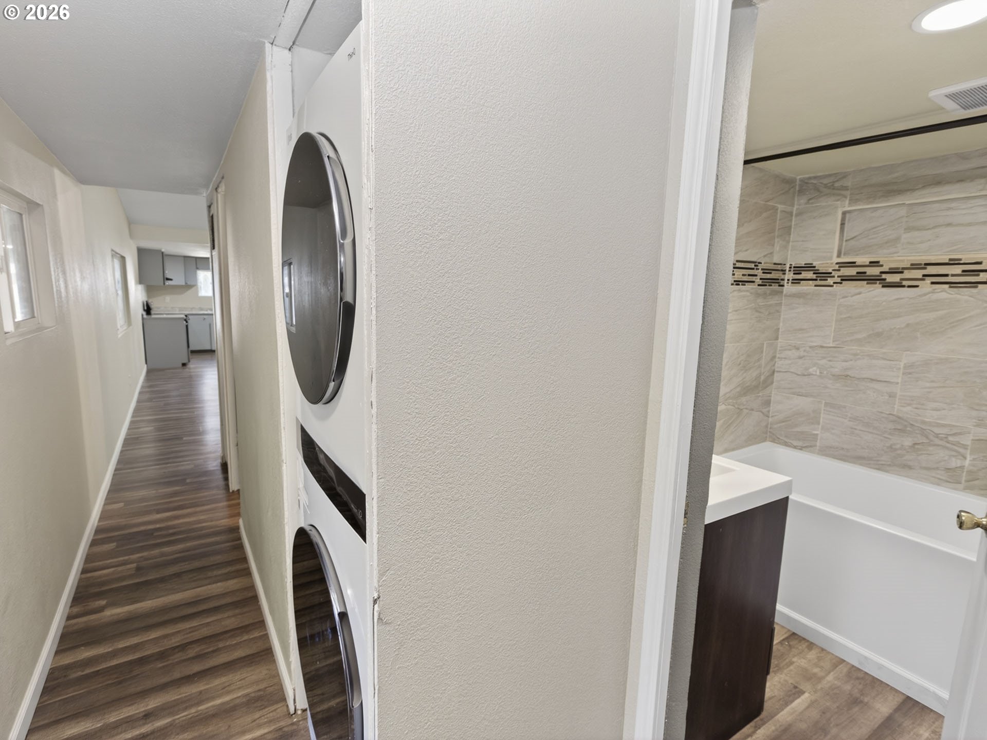 10405 Southwest Denney Road, Unit 31 Beaverton, OR 97008 - Photo 22 of 44 a view of a hallway with wooden floor