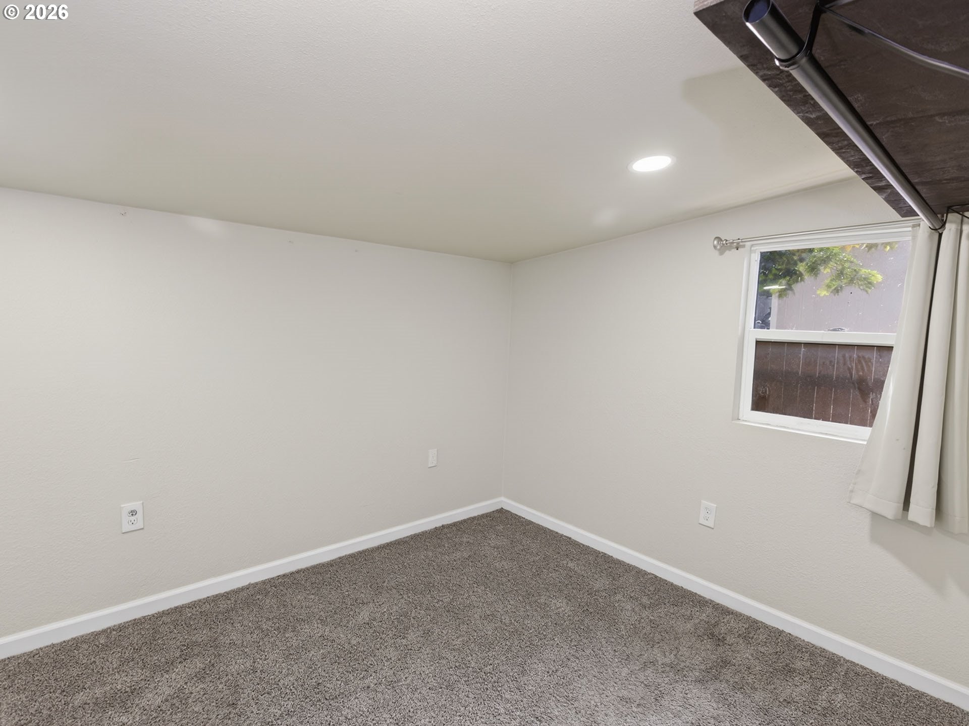 10405 Southwest Denney Road, Unit 31 Beaverton, OR 97008 - Photo 29 of 44 an empty room with windows