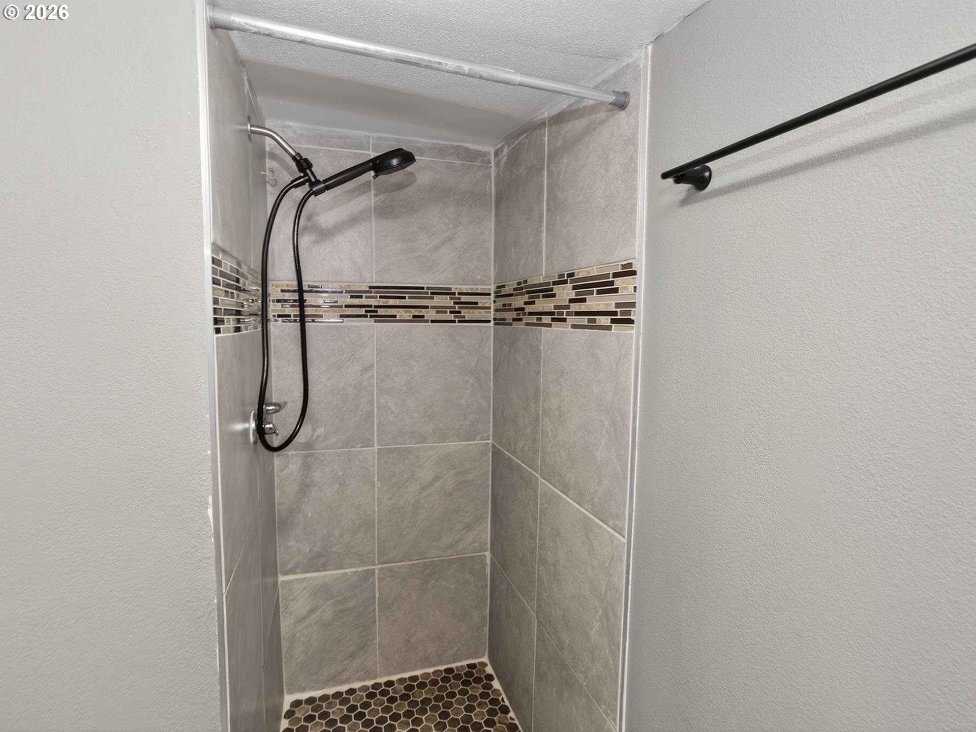 10405 Southwest Denney Road, Unit 31 Beaverton, OR 97008 - Photo 34 of 44 a bathroom with a shower