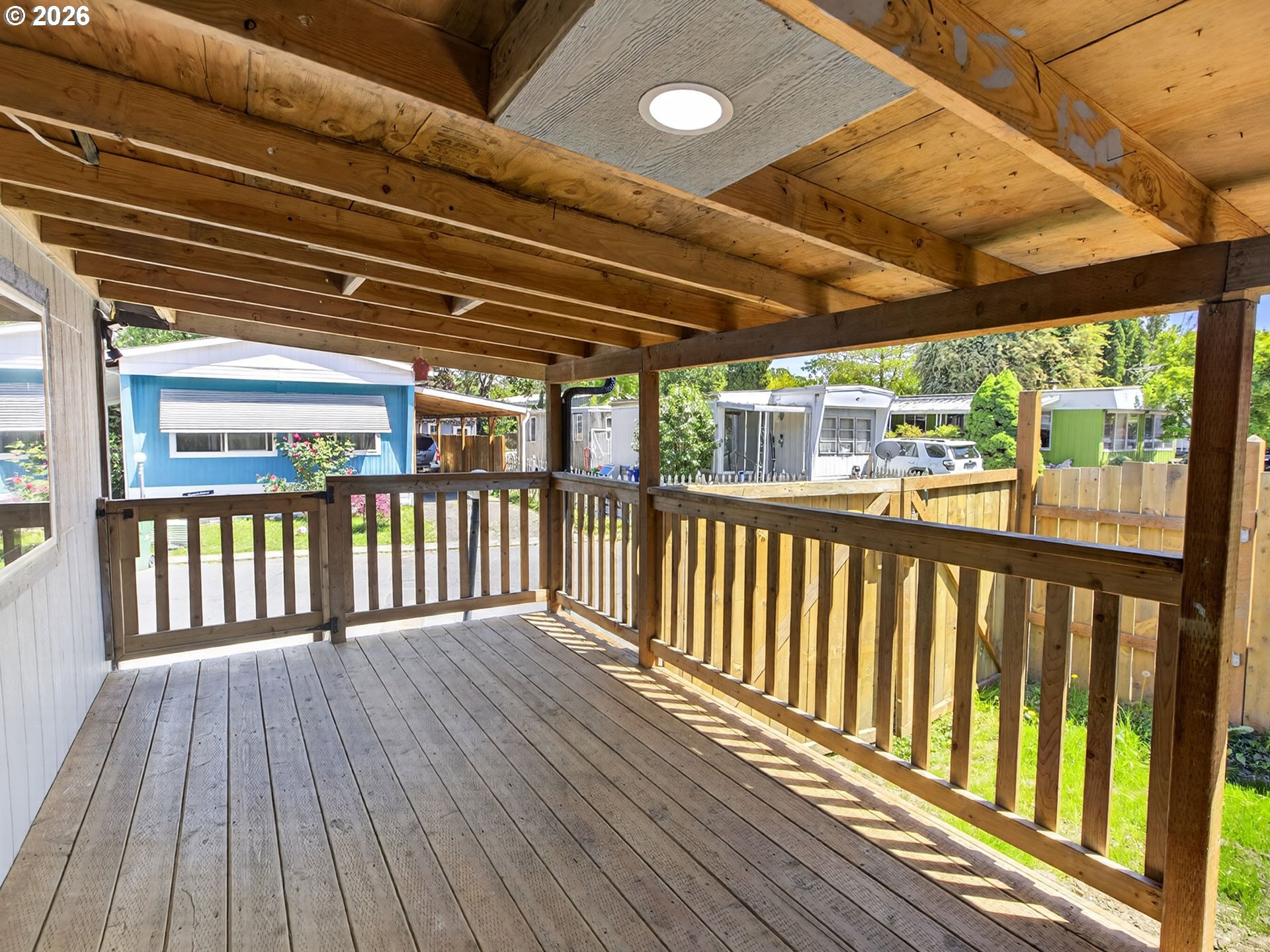 10405 Southwest Denney Road, Unit 31 Beaverton, OR 97008 - Photo 5 of 44 a view of a wooden deck